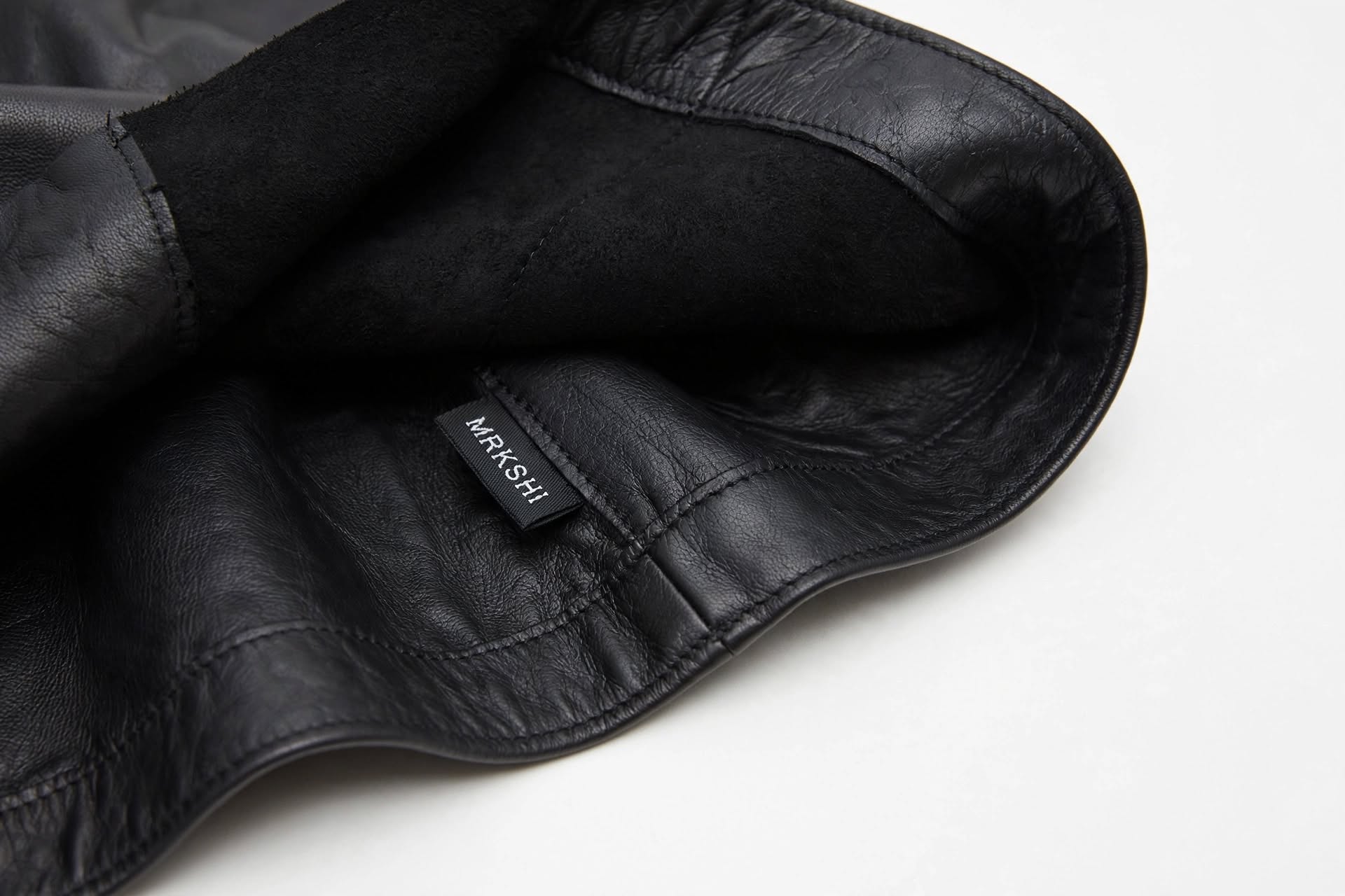 MRKSHI ALINE — Smooth Leather leather Skirt in Black, leather detail