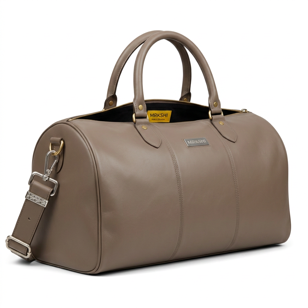 MRKSHI ARISTO — Cowhide leather Bag in Taupe, three quarter view